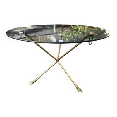 Table basse en verre et laiton pieds tripode en forme de sabot, 1970